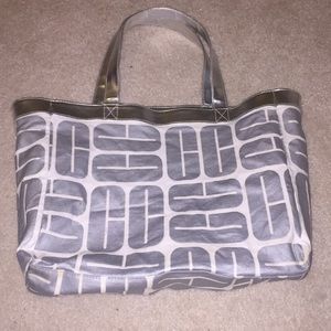 Clinique Silver and White Bag